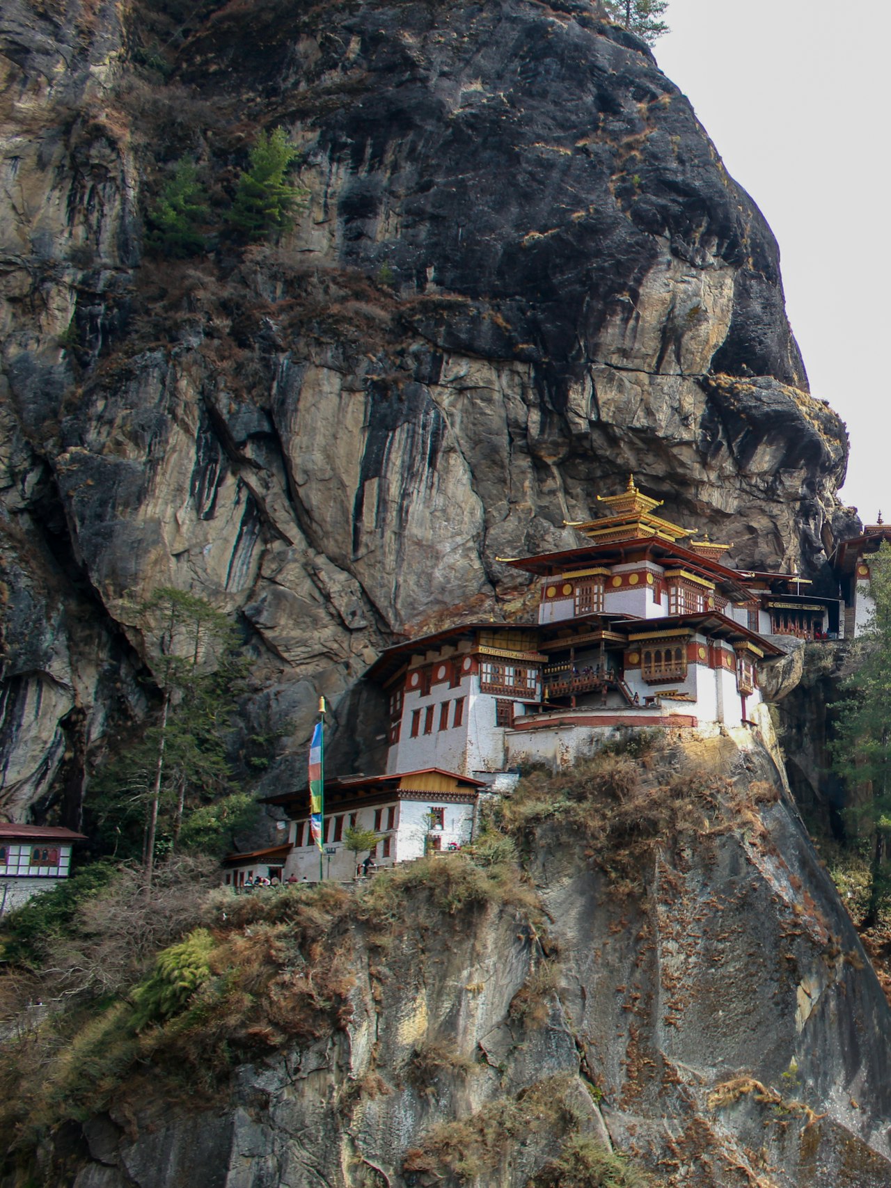 A monastery clinging to a cliff face in Bhutan