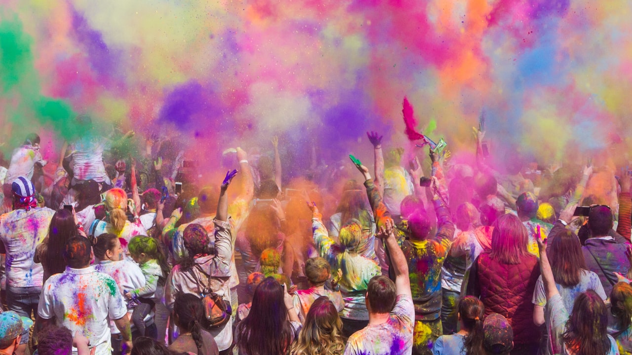 Coloured powder thrown into the air during a festival in India