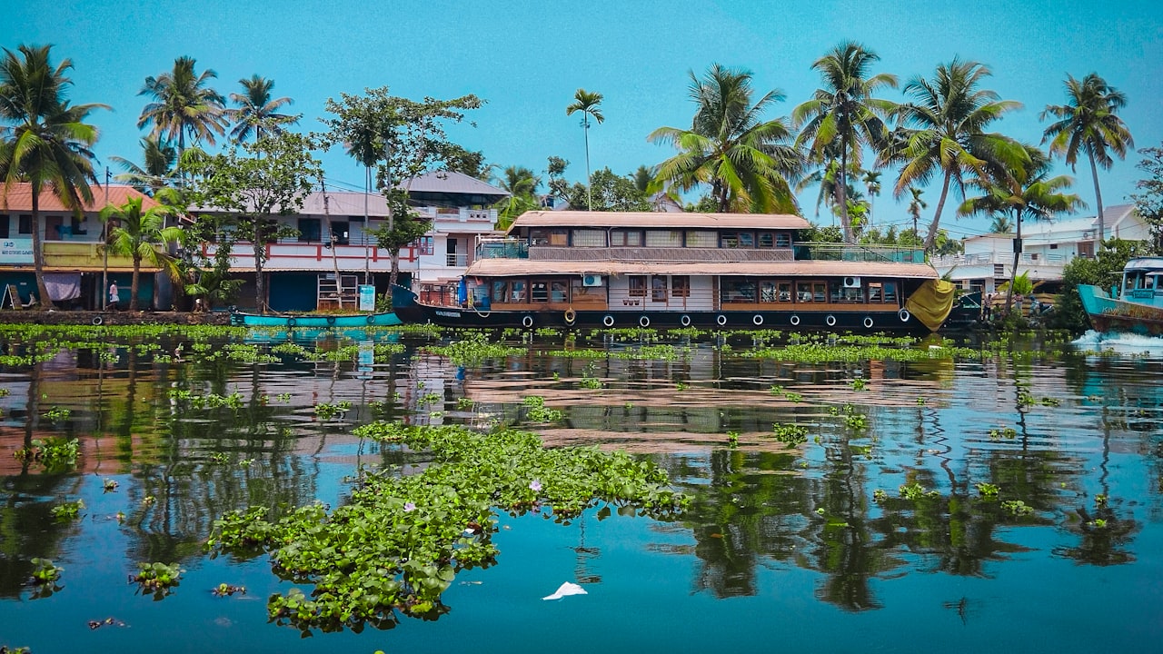 Palm-lined waterways in the Kerala backwaters at dusk